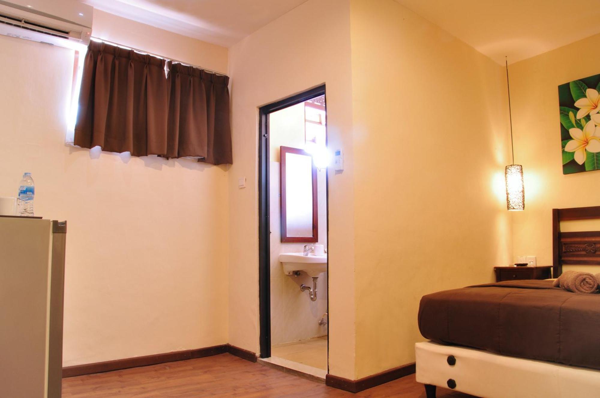 Bemo Corner Guest House Kuta Lombok Rum bild